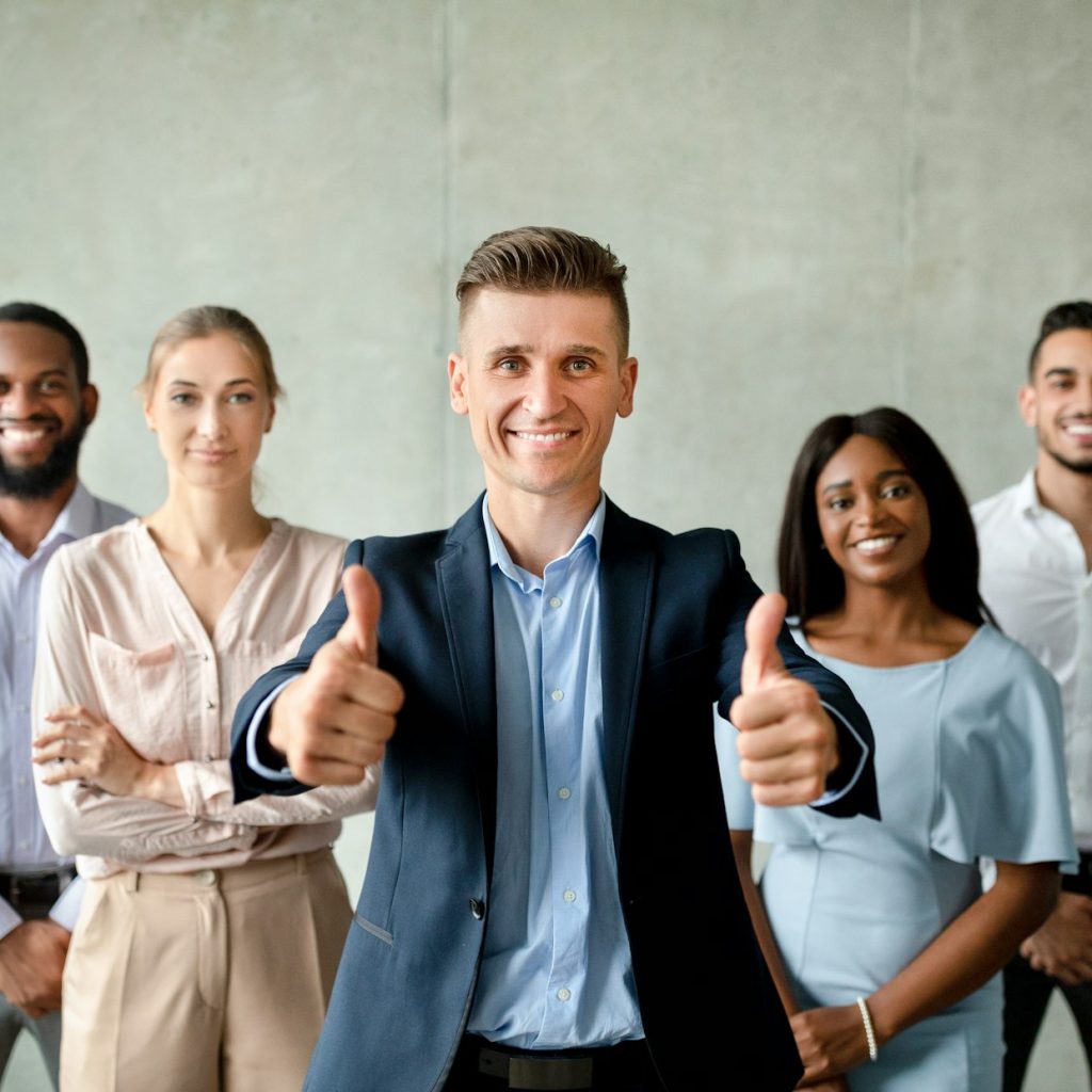 Team Of Professionals. Portrait Of Multiethnic Business People With Male Head Leader